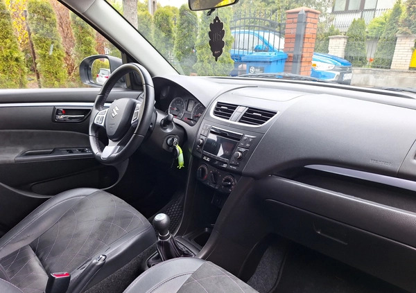 Suzuki Swift cena 34700 przebieg: 100200, rok produkcji 2015 z Żychlin małe 326